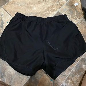 Black athletic shorts, size medium